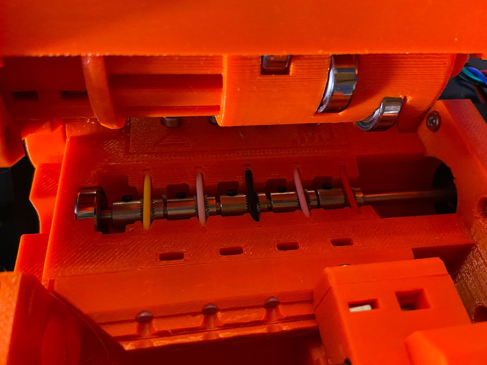 Make sure they are all lined up in between the teeth of the pulleys.